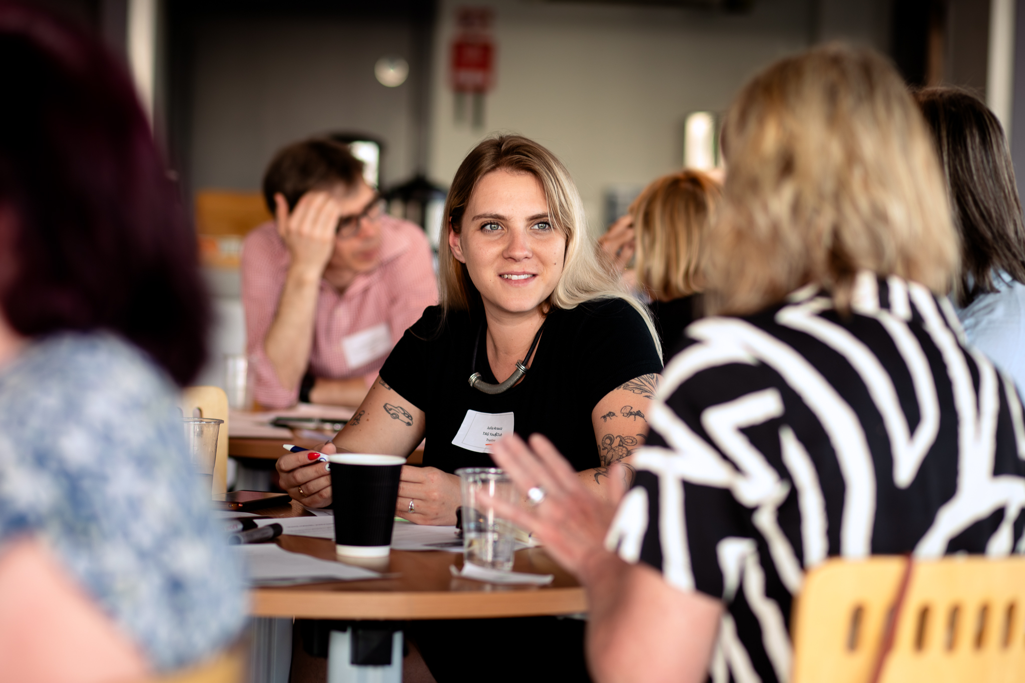 Close up of table with female attendees at Trustee Forward launch event