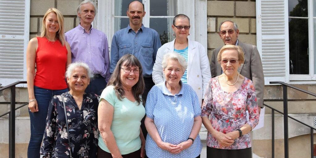 Photograph of Coproduction group standing outdoors on steps of York House